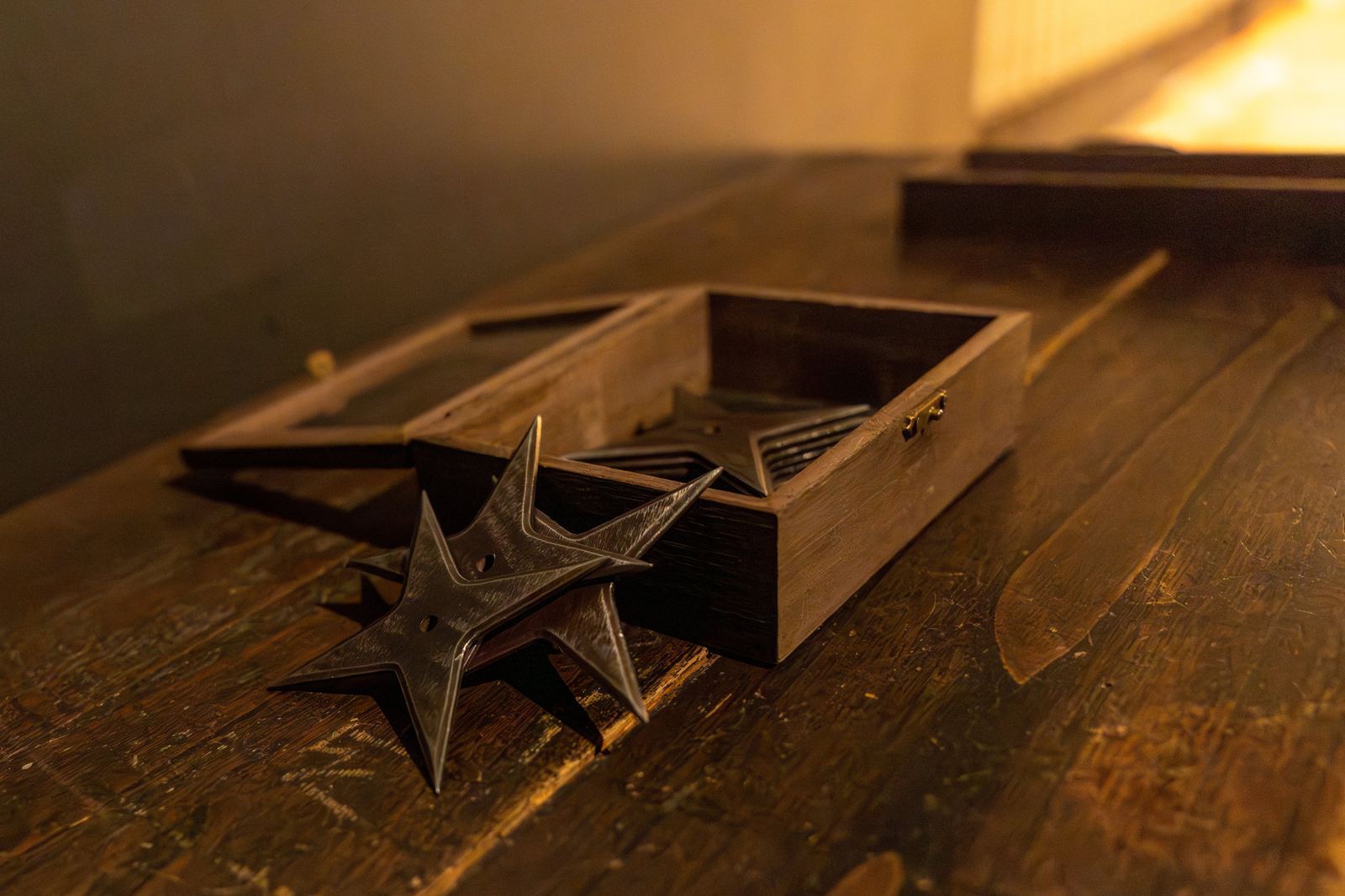Shuriken in a wooden display box
