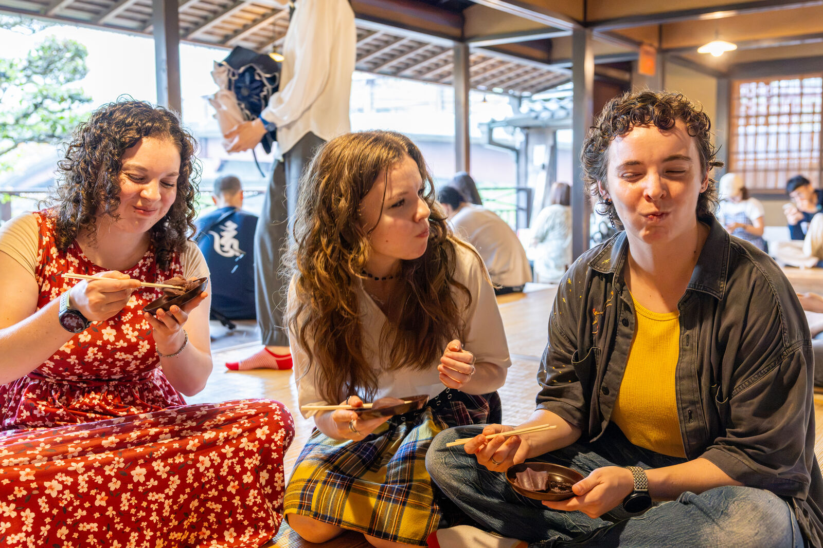 Guests sitting together and enjoying mochi