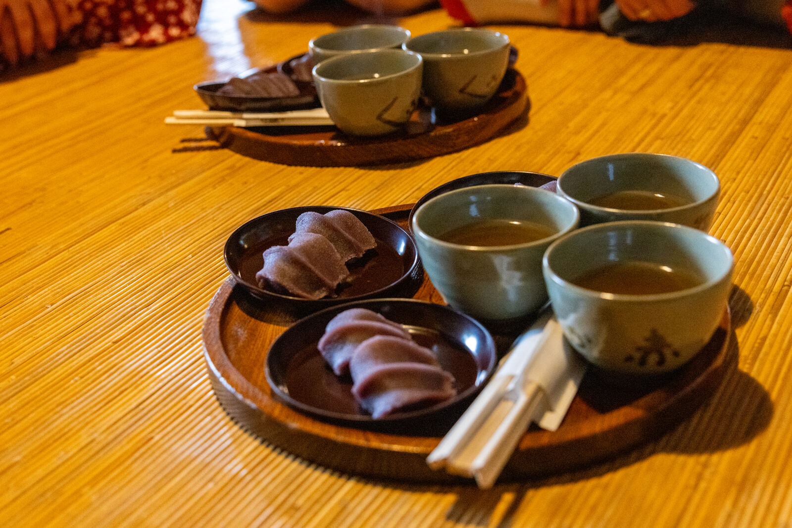A plate of Akafuku mochi with green tea