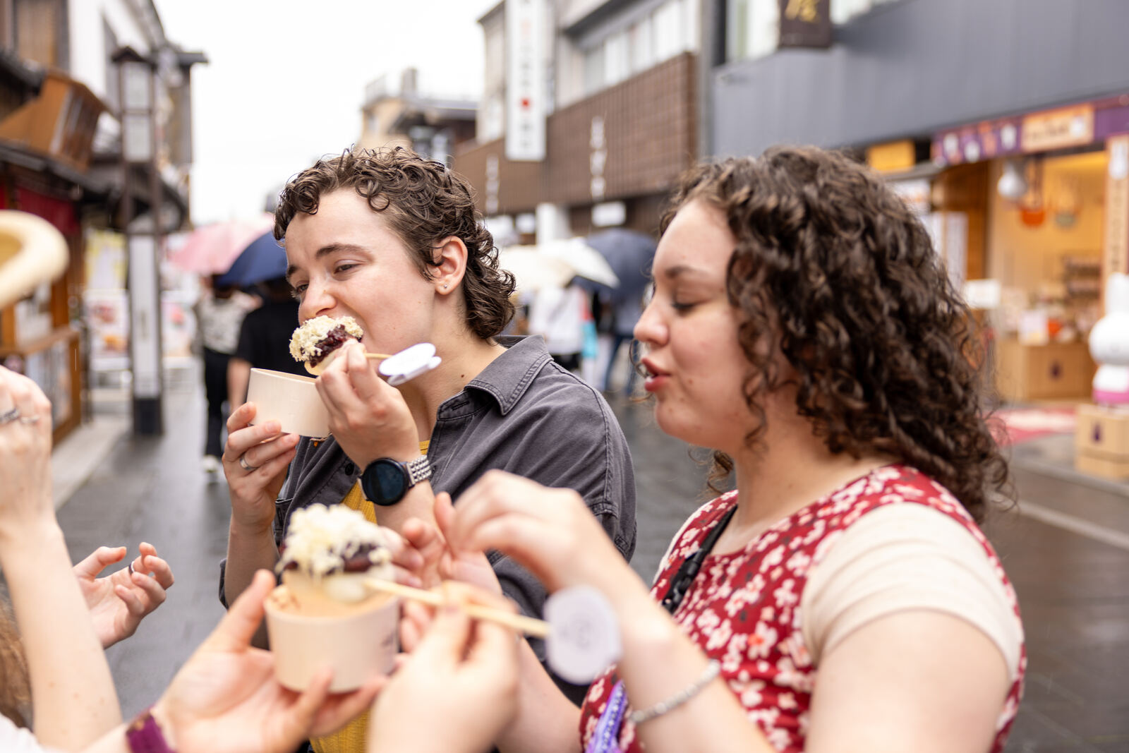 Guests enjoying soft-serve ice cream in Okage Yokocho