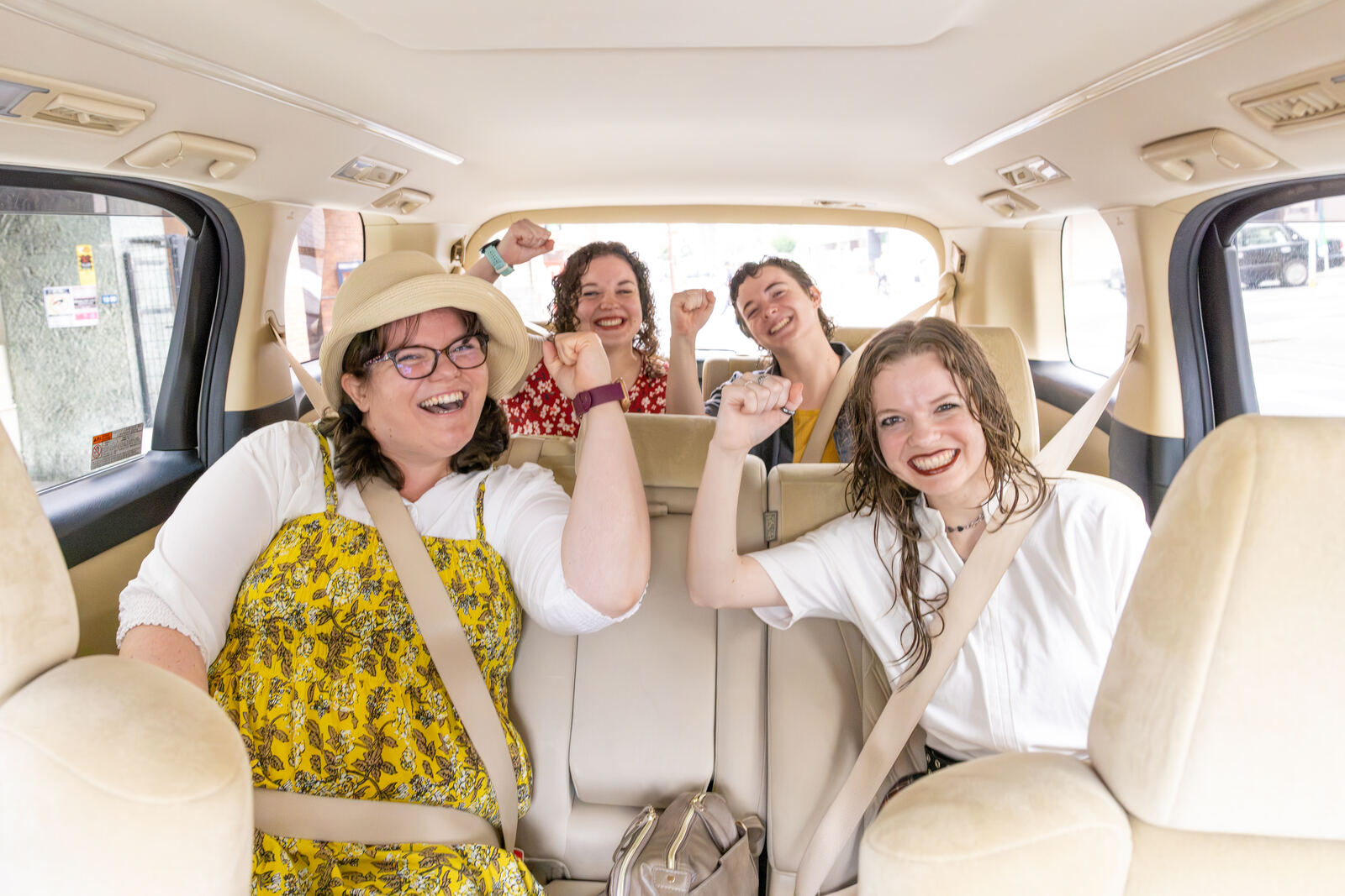 Guests cheering inside the tour vehicle at the start of the day