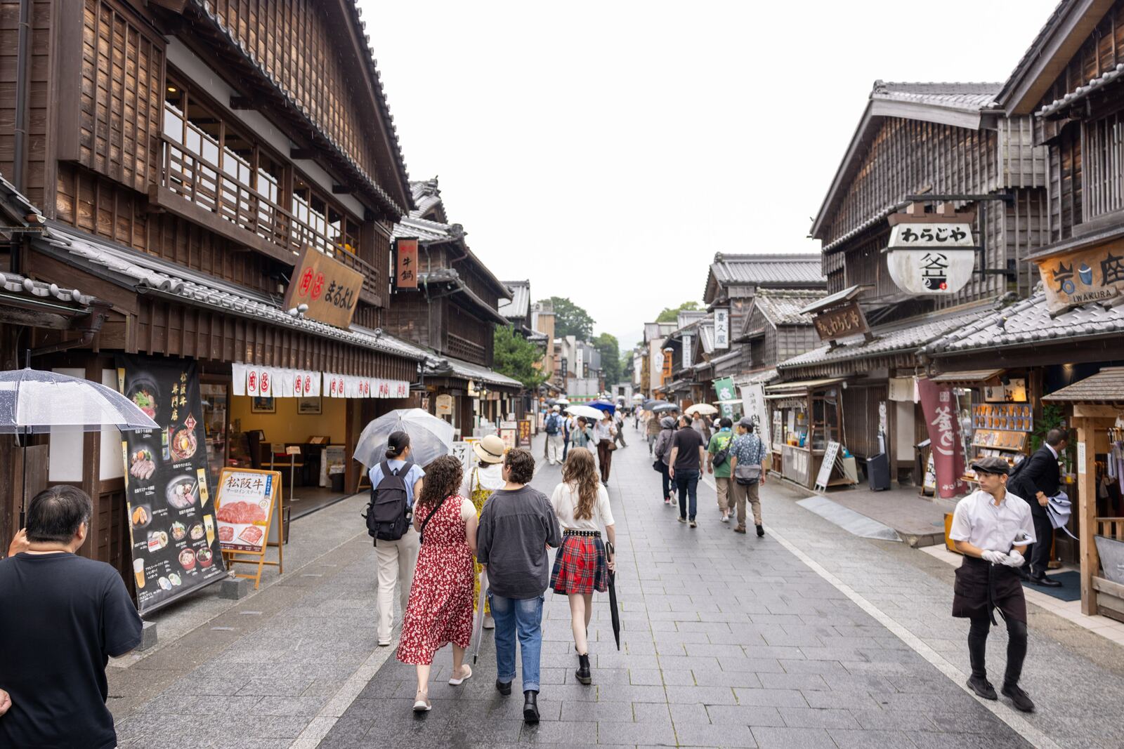 The bustling Okage Yokocho street lined with traditional shops