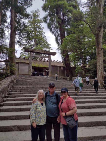 Guests at the stone steps of Ise Grand Shrine torii gate