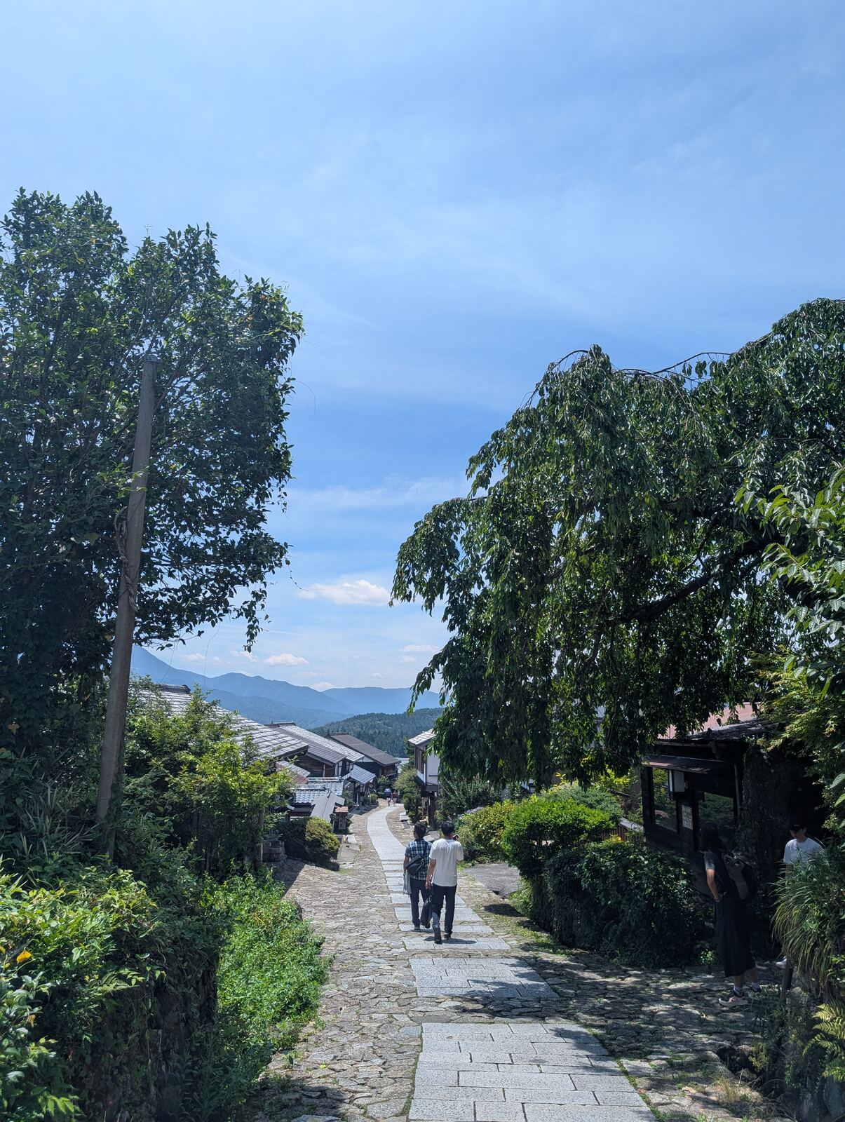 The stone street of Tsumago descending through the post town